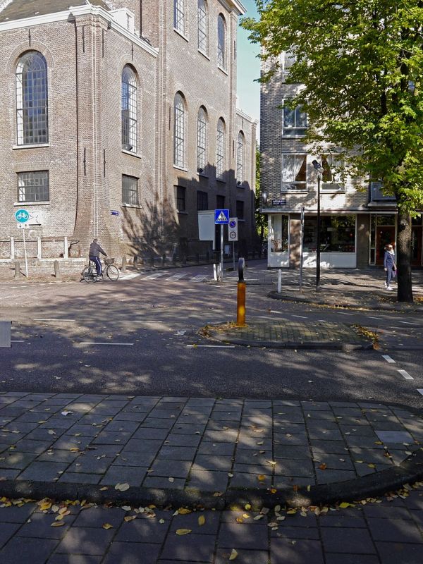 2016.10 - Amsterdam photos - Old brick & 17th century church Oosterkerk at Wittenburg, with sun-light and shadows in urban Fall - geotagged free urban picture, in public domain / Commons CCO; Dutch ur...