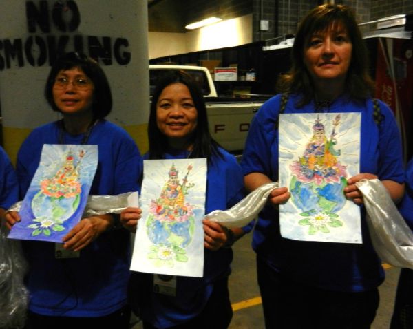 3 Happy Volunteers holding original watercolor paintings of Padmasambhava, Guru Rinpoche, with khatas, as offerings, preparing for mandala offering to His Holiness 14th Dalai Lama of Tibet, Kalachakra...