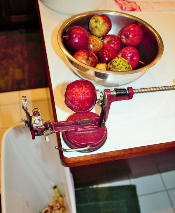 Apple peeler attached to counter