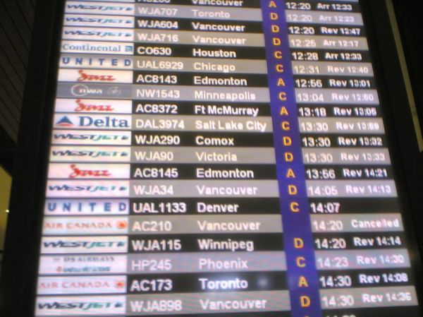 Arrivals board at YYC