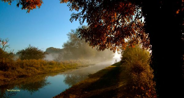 Autumn sunrise on still waters