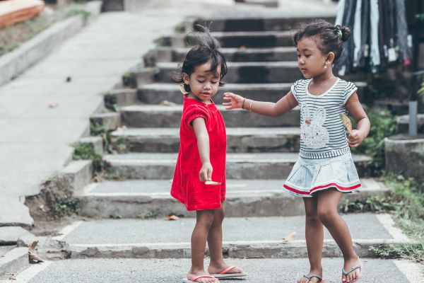 BALI, INDONESIA - MAY 17, 2018: Balinese girls in Ubud. Indonesian kids.