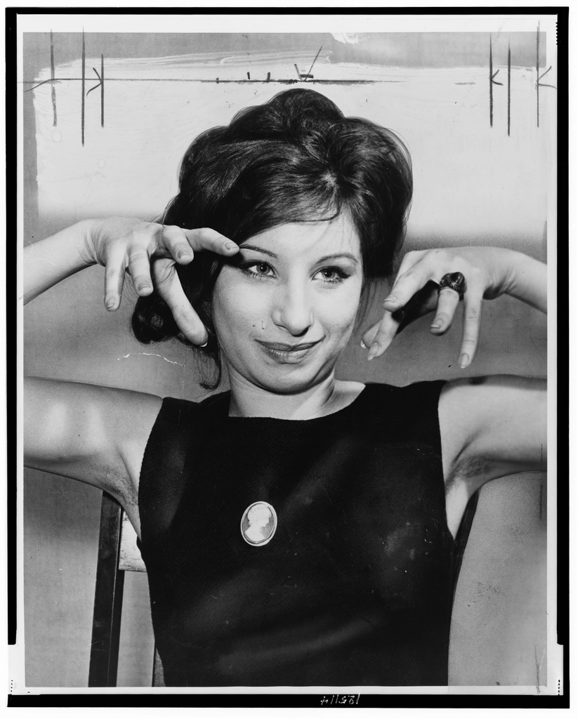 Barbra Streisand, half-length portrait, facing