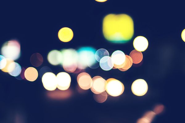 Bokeh from street lights, cars and motorbikes at night. Bali island bokeh.