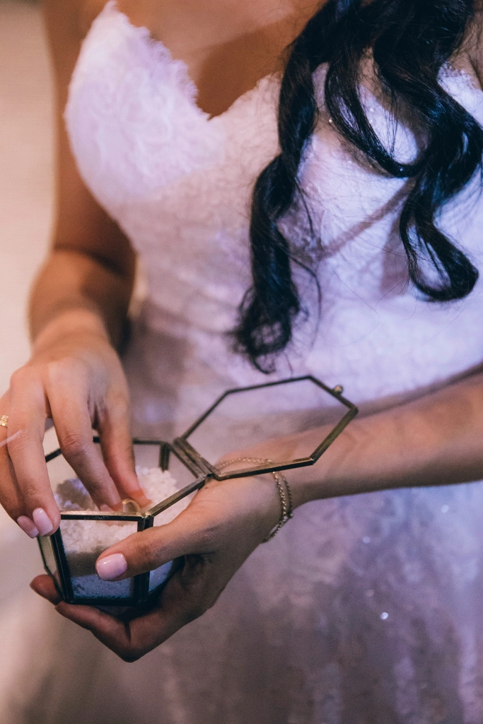 bride pulls ring getting ready