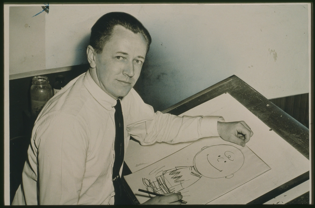 Charles Schulz, half-length portrait, facing