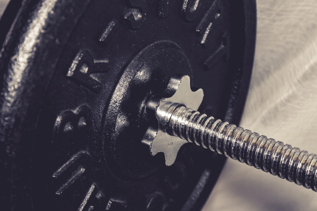 Closeup weight plate bar
