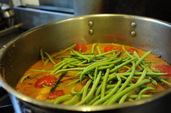 Community size vegetarian fresh green bean soup, tomatos, pot, kitchen, Breitenbush Hot Springs, Breitenbush, Oregon, USA