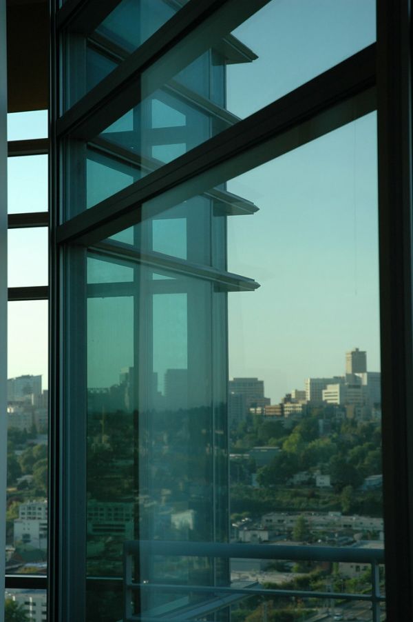 Complex glass and steel corner, Amazon.com, PAC-MED building, overlooking Pill Hill and International district, Seattle, Washington, USA