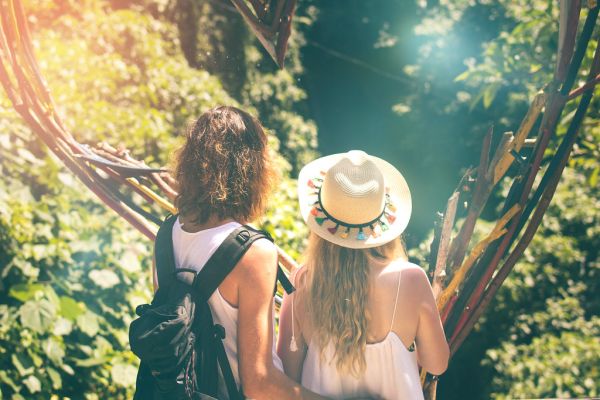 Couple of tourist in the jungle of Bali island