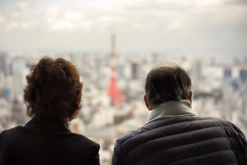 Couple views city skyline together