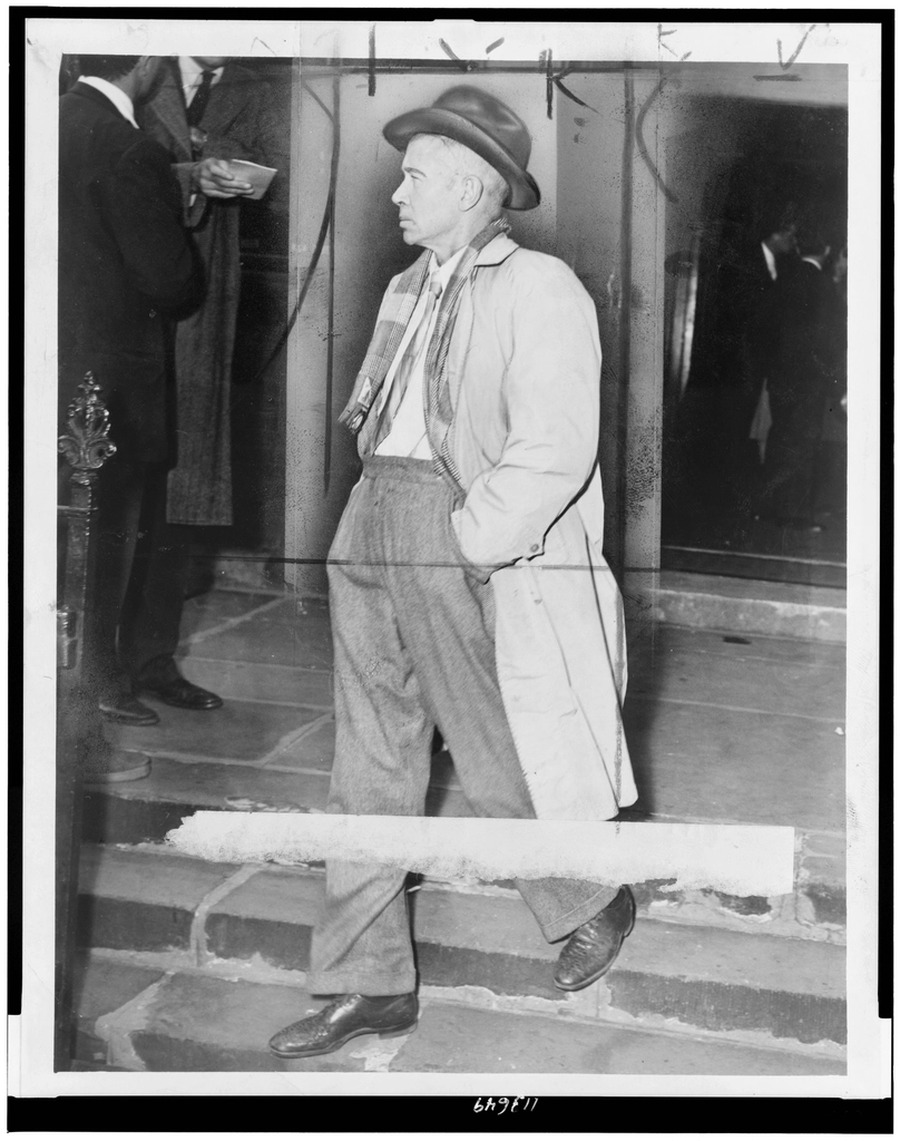 E.E. Cummings, full-length portrait, facing