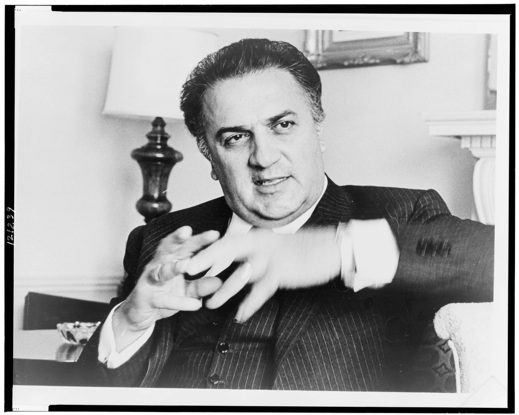Federico Fellini, half-length portrait, facing