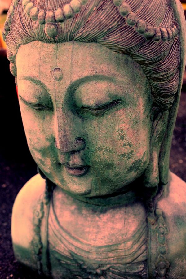 Female Bodhisattva bust, ornate hair style, concrete garden statue, Lake City Way, Seattle, Washington, USA