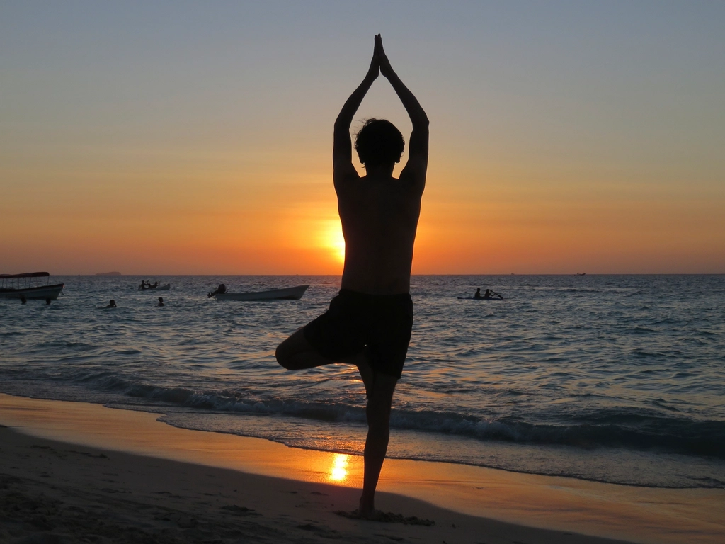 Free silhouette woman doing yoga