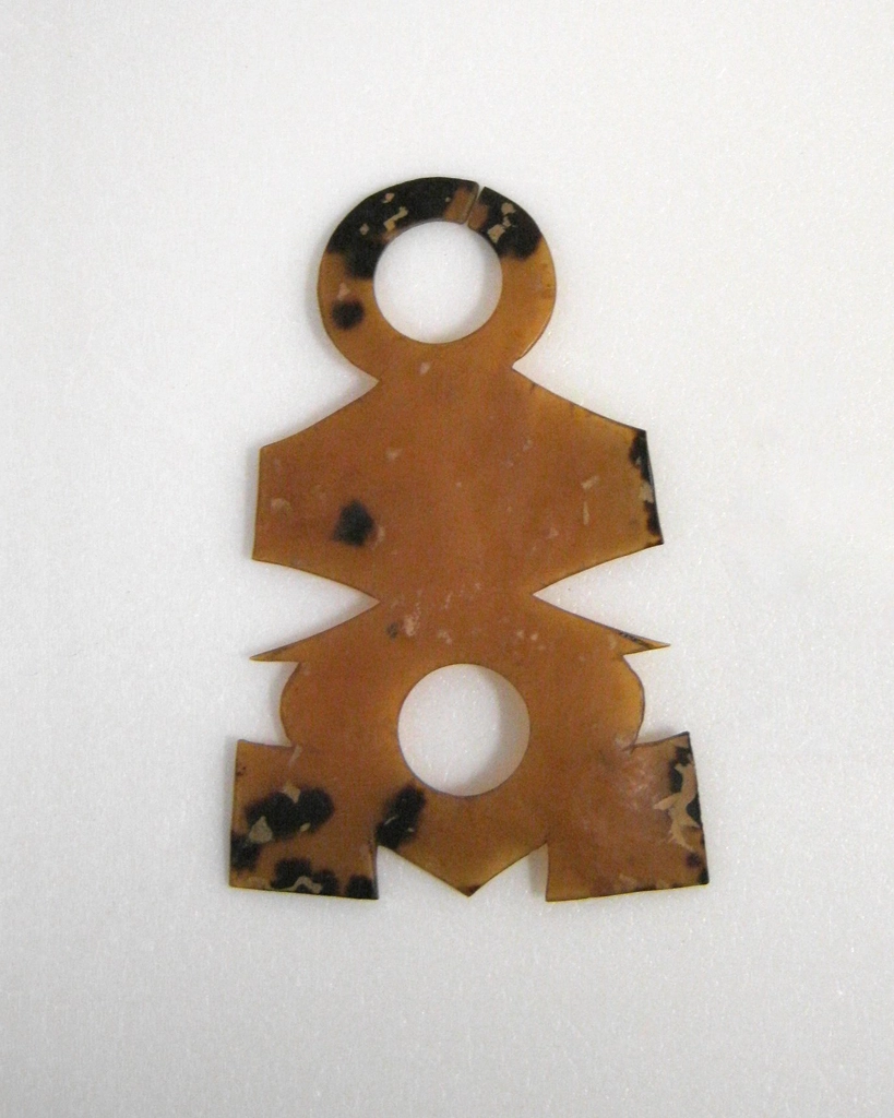 geometric shape 2 circular cutouts;
