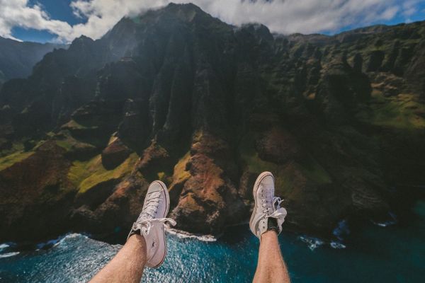 Guy sits on mountain