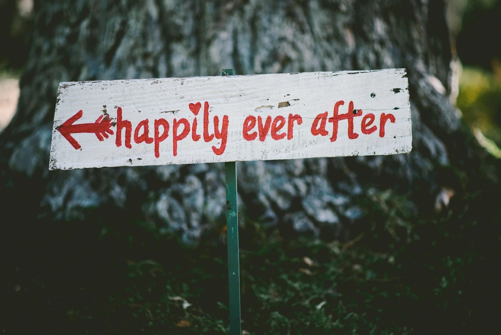 hand-painted sign reads 'Happily ever