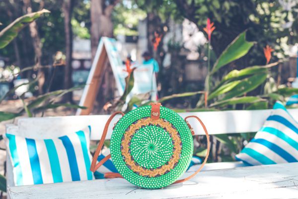 Handmade natural organic rattan handbag. Tropical island of Bali. Eco-bag concept. Ecobags from Bali.