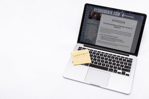 Investment sticker on laptop