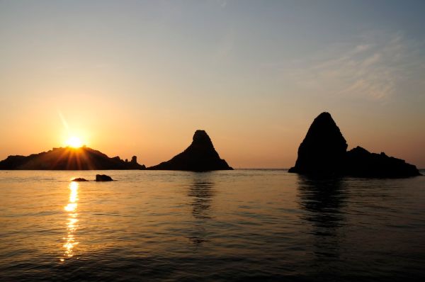 Islands of the Cyclops at Dawn Sicily Italy - Creative Commons by gnuckx