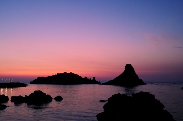 Islands of the Cyclops at Dawn Sicily Italy - Creative Commons by gnuckx