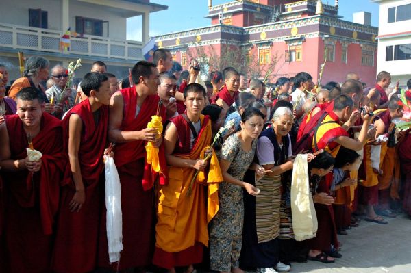 Lamdre liberation Procession: crowd eagerly awaiting the high Sakya Lama, HH Dagchen Rinpoche and family, Tharlam Courtyard, Boudha, Kathmandu, Nepal