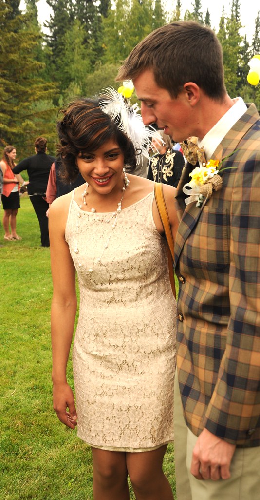 Laughing - Sophia Isabel and Travis Olsen (groomsman wearing a corsage), vintage style clothing, Wedding of Jessie and Chris, garden, family home, Fairbanks, Alaska, USA