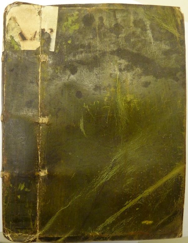 Left cover of a green parchment binding