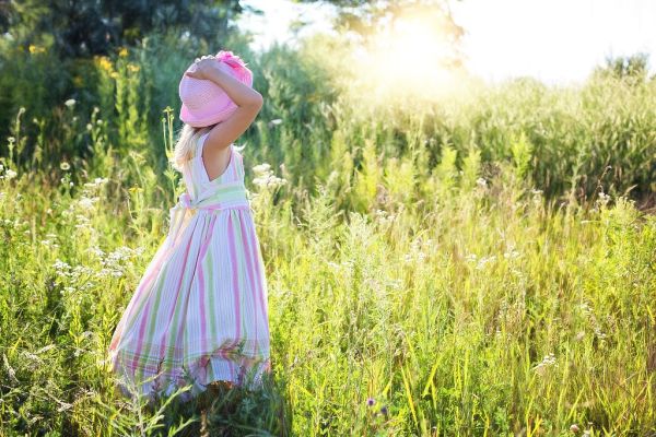 Little girl in garden