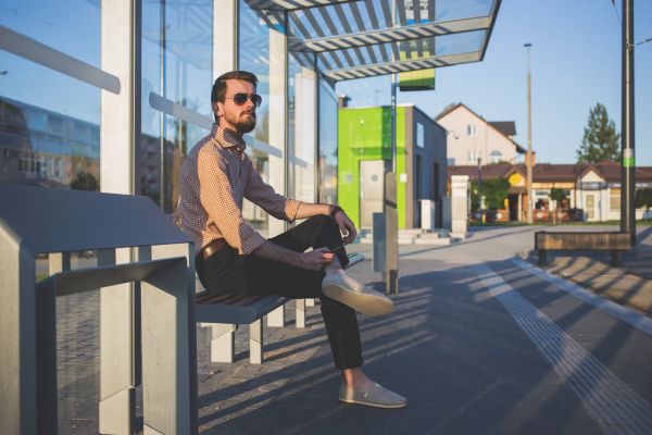 Man at tram stop