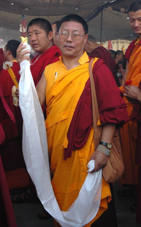 Monk's offering, incense, katag, formal robes, mala on wrist, watch, Dharma bag, Bodhisattva Day, Sakya Lamdre, Tharlam Monastery Courtyard, Boudha, Kathmandu, Nepal