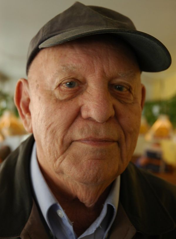 My beloved Daddy just died. Here he is wearing a jaunty cap, where we met for lunch at the Varsity Inn, Seattle, Washington, USA. He was a very playful cowboy.