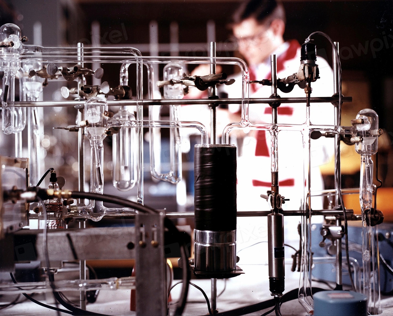 Operator carefully mixes coolant for addition