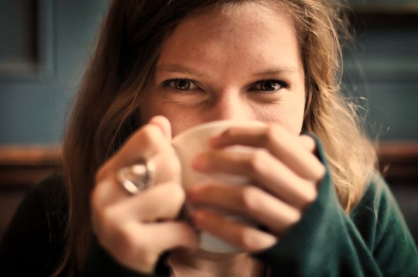 Portrait of Female Drinking from Cup