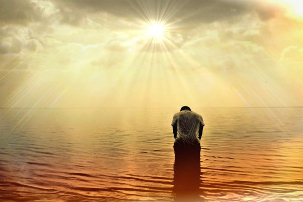 Sad man on sea wave