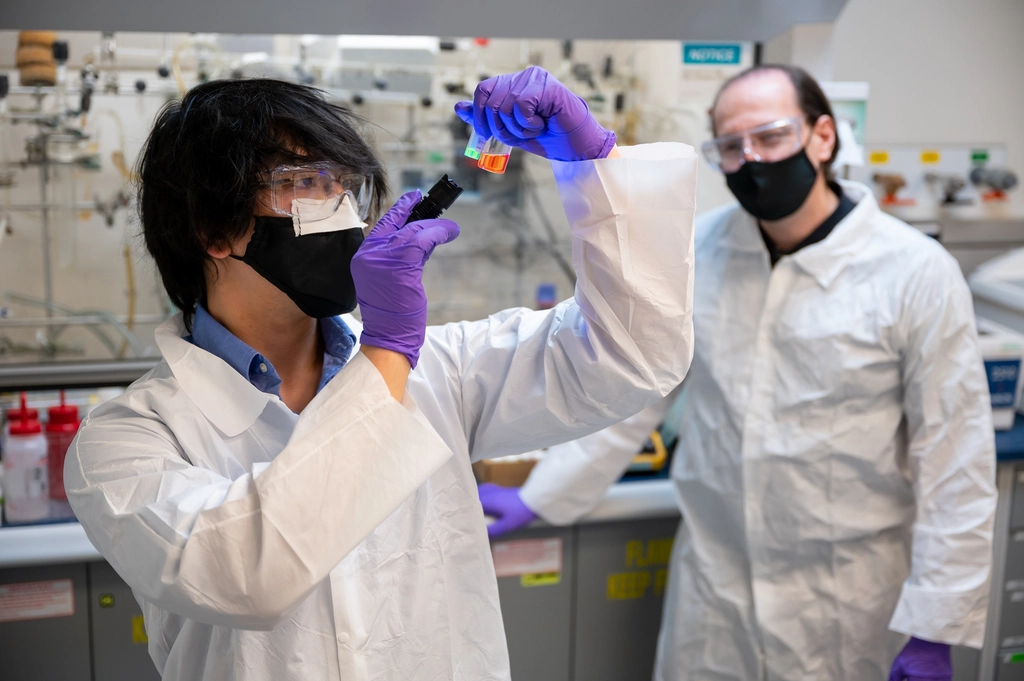 Scientists lab, looking test tube