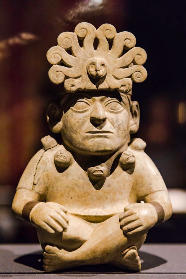 Seated figure