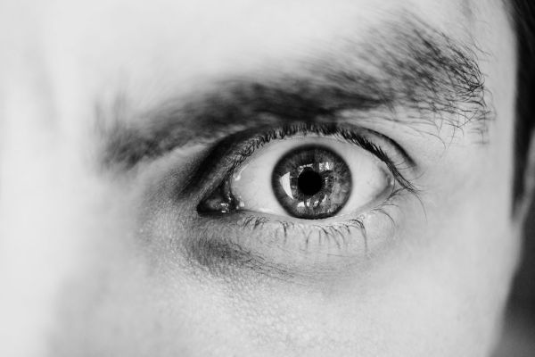 Single male eye in black and white