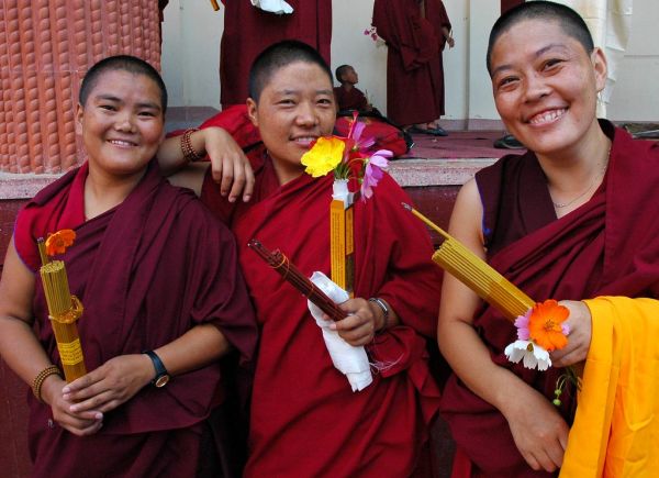 Sister Nuns (Ani's) with Bodhisattva Day Offerings of Flowers and Incense, Tharlam Monastery of Tibetan Buddhism, Boudha, Nepal