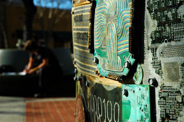 Student studying, Digital DNA, sculpture in the City of Palo Alto, Art in Public Places, 9.01.05
