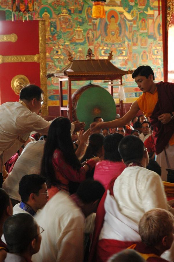 Taking the Bodhisattva vow bow & 6 arrows from HE Avikrita Sakya, promises in all the 10 directions, inside Tharlam Monastery of Tibetan Buddhism, Boudha, Kathmandu, Nepal