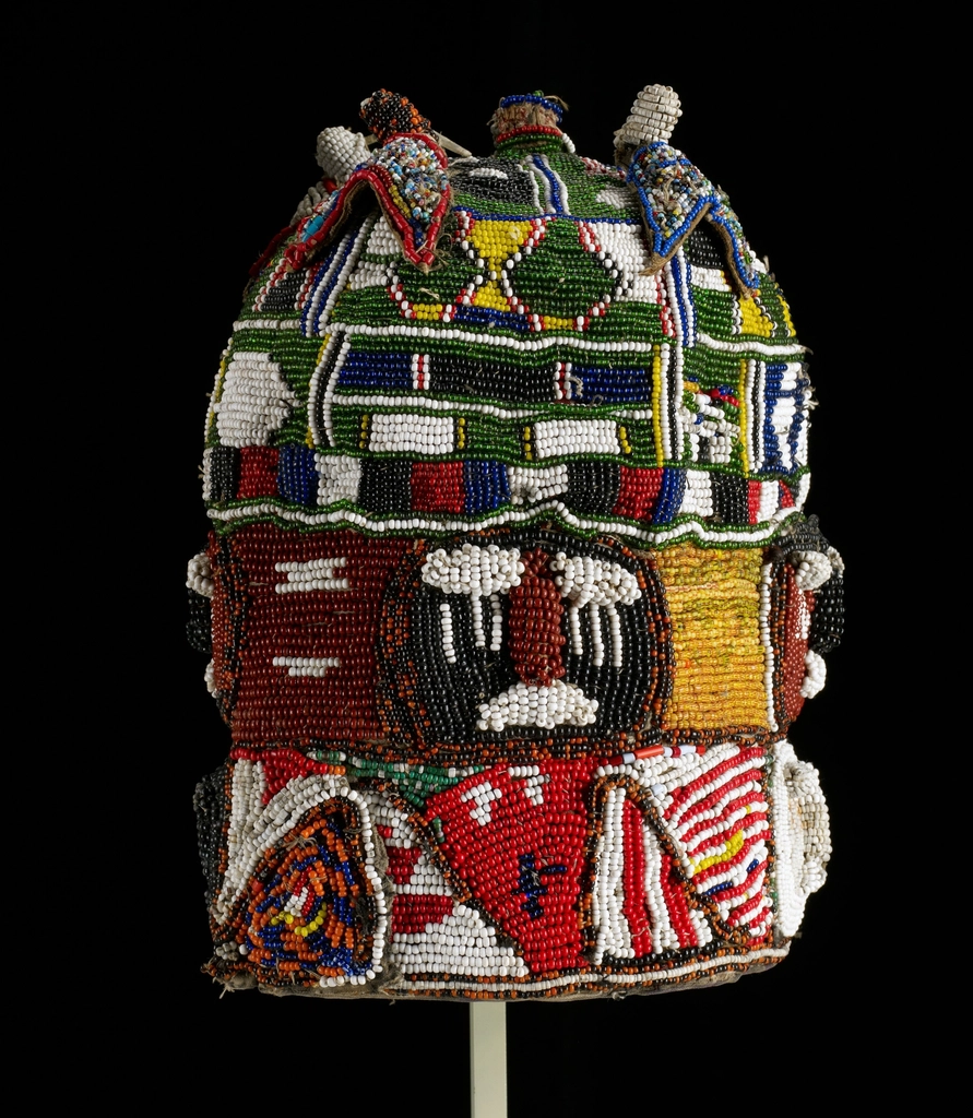 tall dome-shaped beaded hat; five