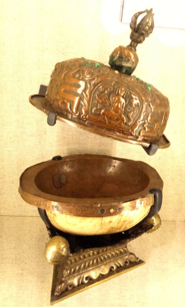 Tibetan Buddhist Tantra (Vajrayana) kapala (Sanskrit for 'skull') a skullcup made from a human skull used as a ritual implement (bowl), elaborately mounted with copper vajra, seed syllables, depiction...