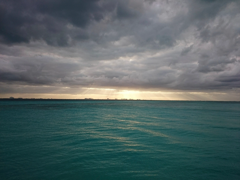 turquoise sea city skyline horizon