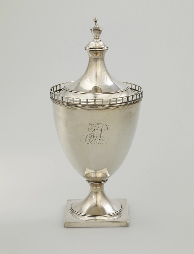 urn shape square base; openwork