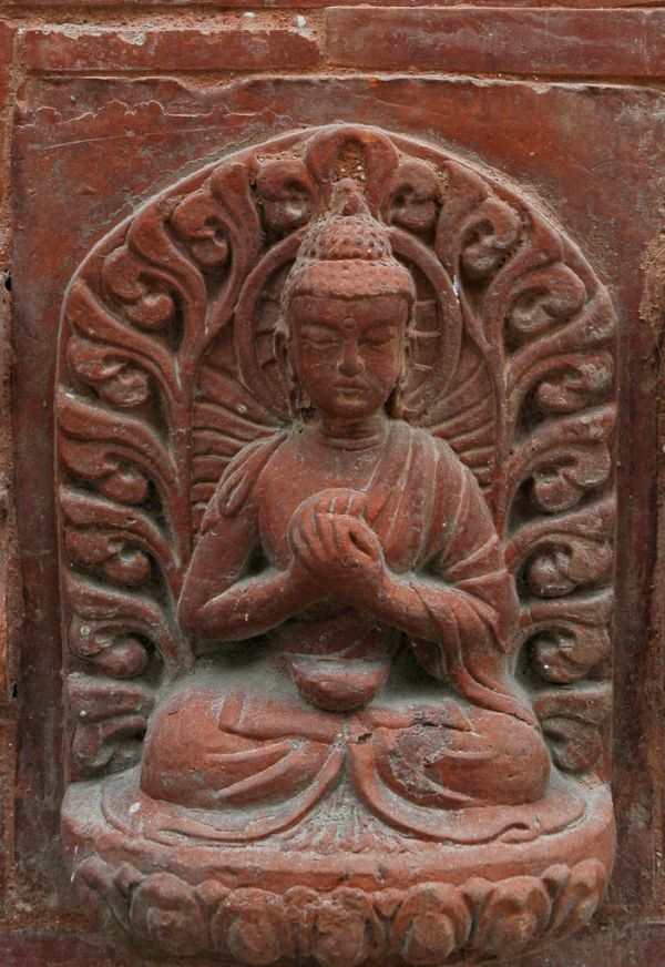 Vairochana in the Dharmachakra Mudra, clay terracotta, Padmasambhava's Tank in Boudha Stupa Kathmandu Nepal