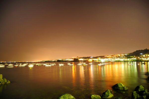 View of Aci Castello across the sea from Acitrezza Sicilia Italy Italia - Creative Commons by gnuckx