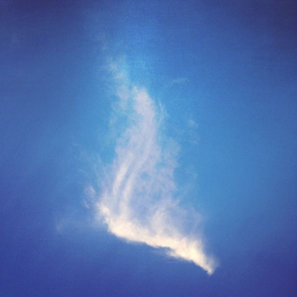White Smoke on Blue Background