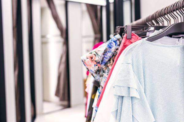 Woman clothes in the store. Fashion store. Shopping mall.
